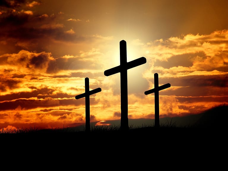 silhouette of three crosses.